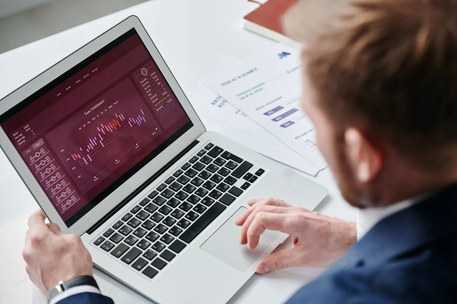 Business analyst reviewing an enterprise ERP analytics dashboard
