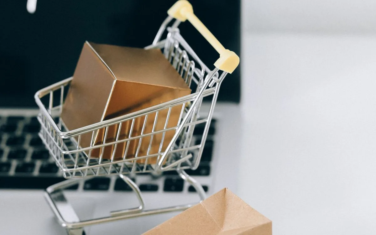 Online shopping cart on a laptop